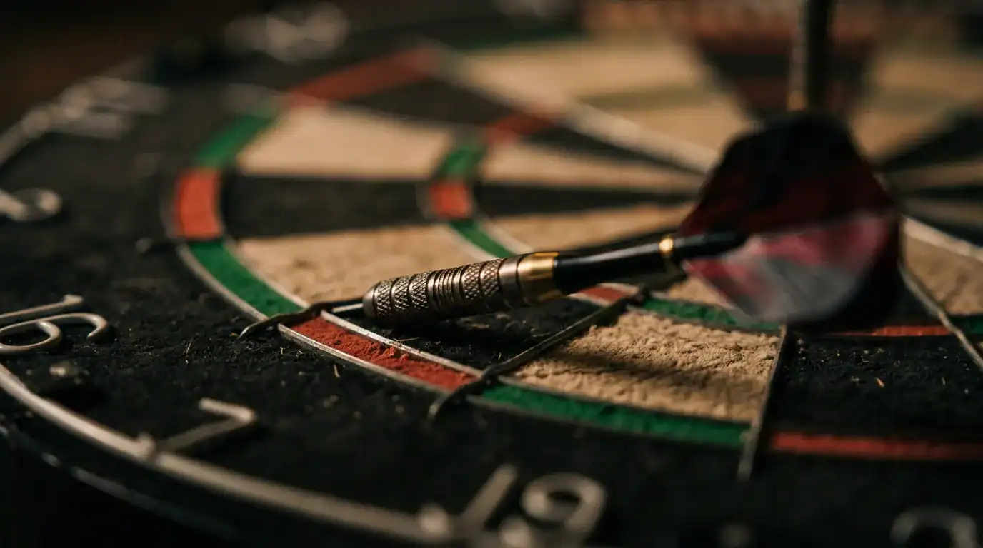 Close-up of a tungsten dart embedded in a double segment on a bristle dartboard