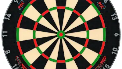 Winmau Blade 6 Triple Core Carbon professional bristle dartboard showing PDC endorsement and blade wire system